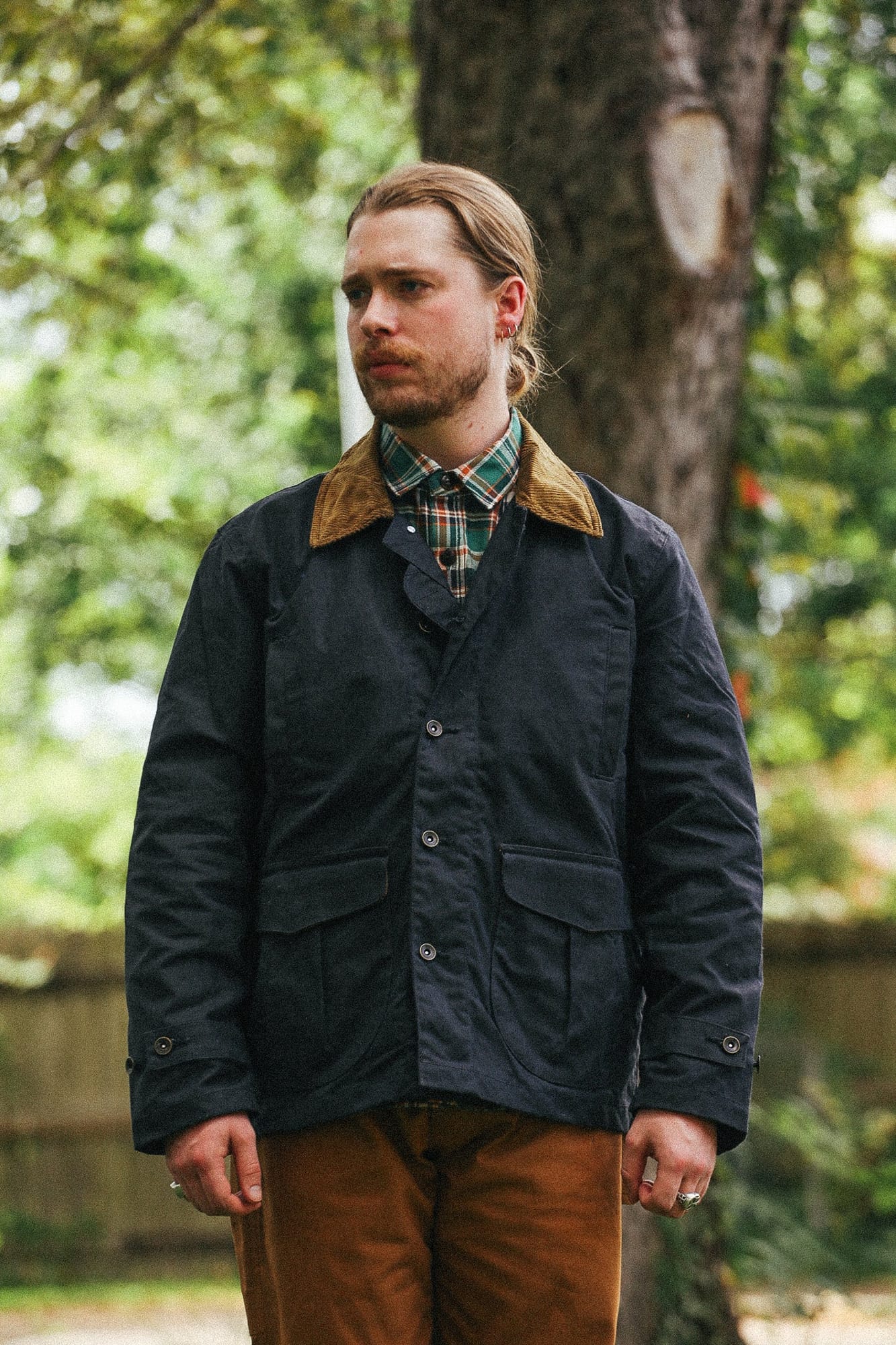 A New Medium black waxed Sportsman’s Jacket worn from the front.