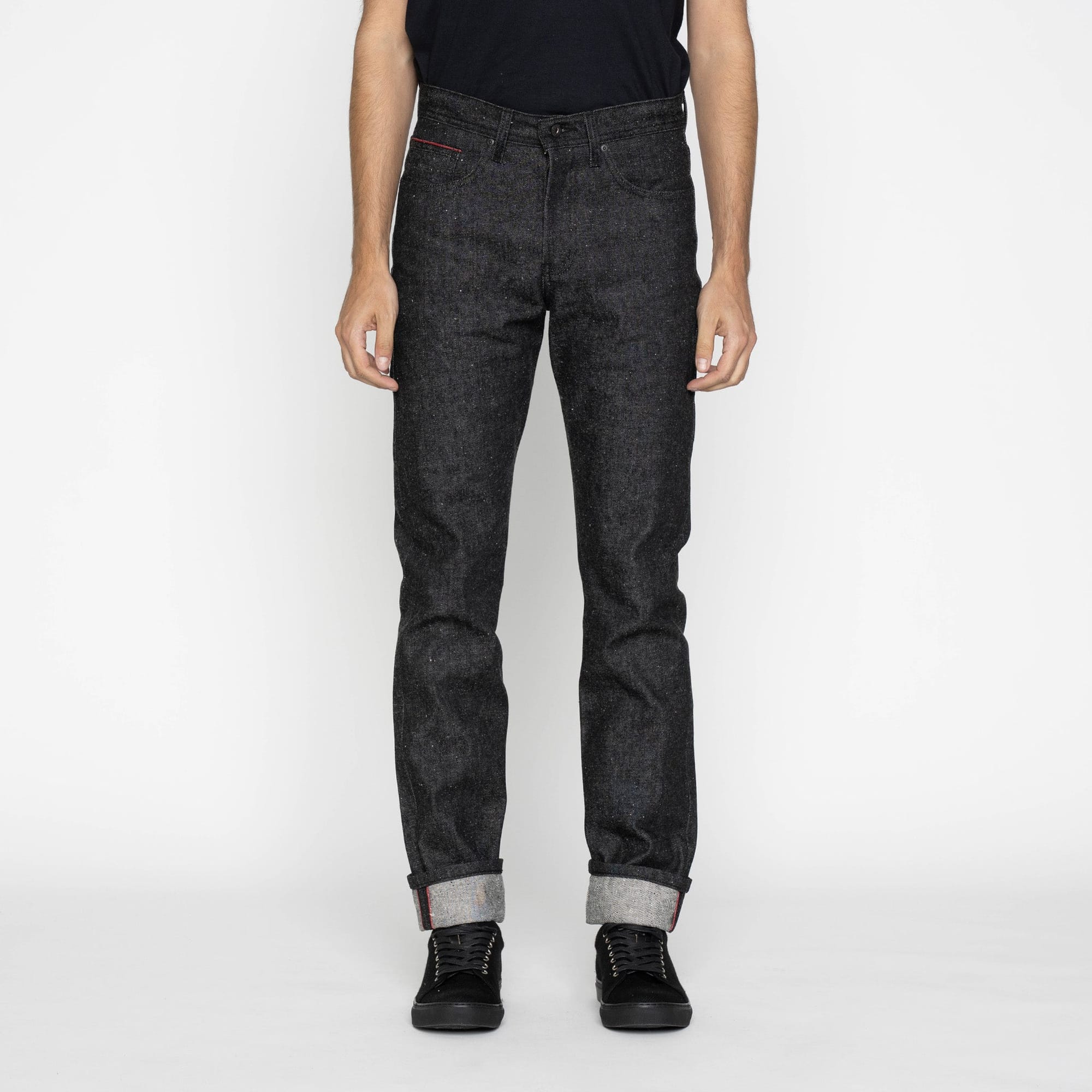 Weird Guy Hellraiser jeans worn from the front, showing the tapered leg.
