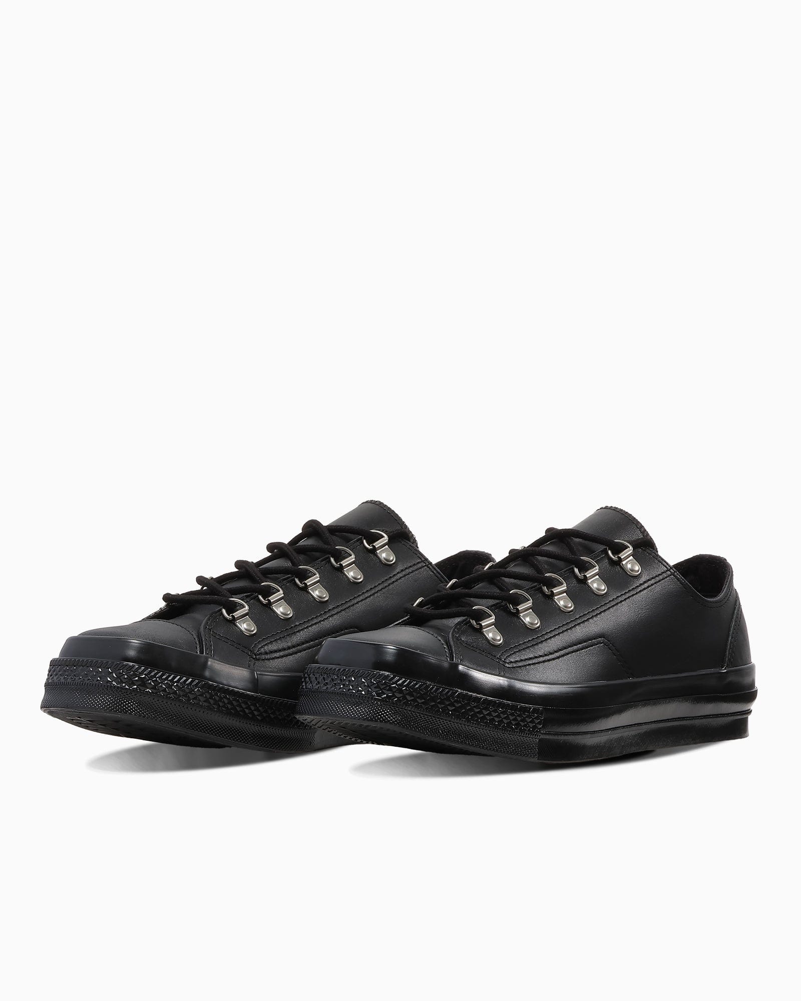 Pair of black leather All Star Squaretoe shoes with D-ring lacing.