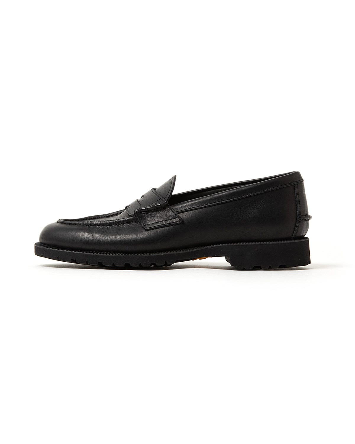 Side profile of the black REGAL Shoe & Co. and nonnative loafer.