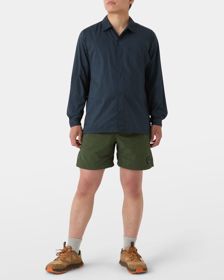 Navy Kami Shirt worn with shorts, front