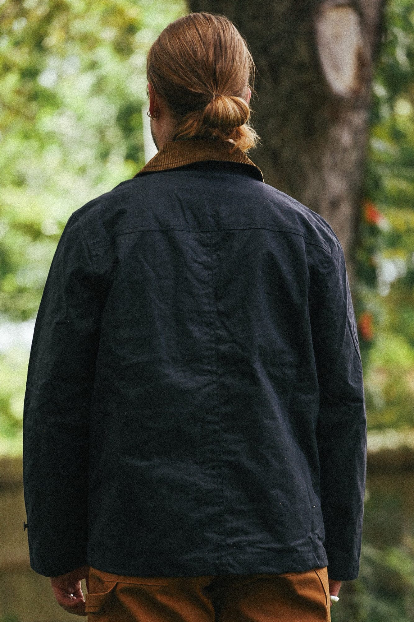Back view of A New Medium black waxed Sportsman’s Jacket.