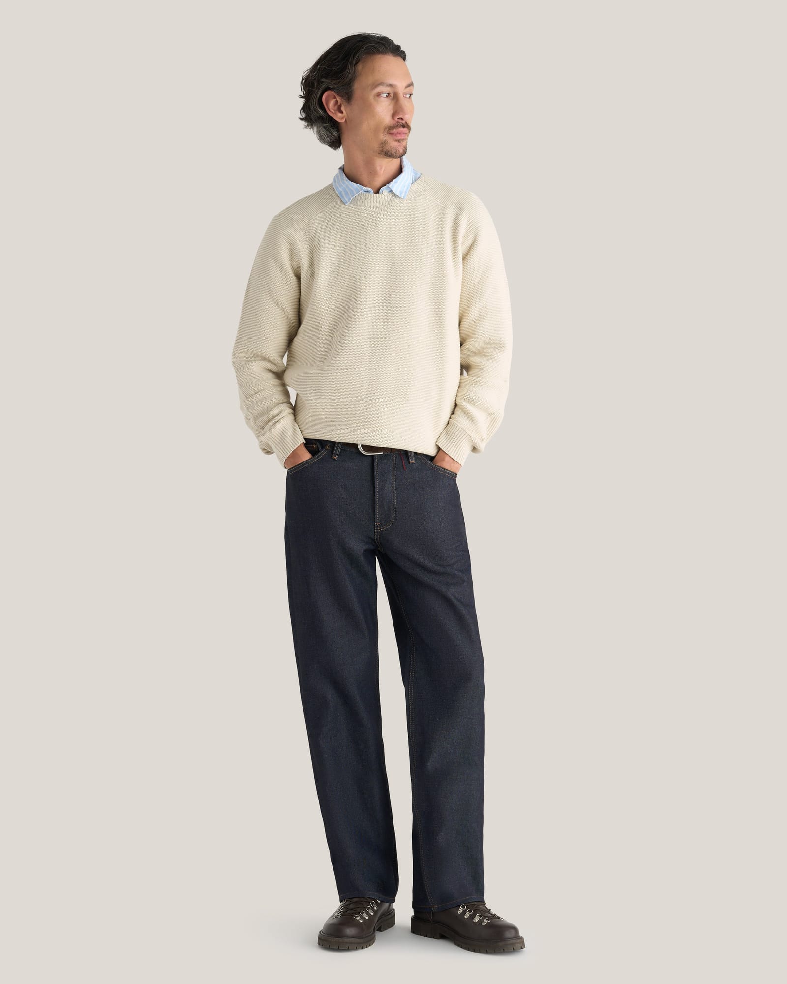 Hiut Jerald Super Zero Indigo jeans worn with a cream sweater.