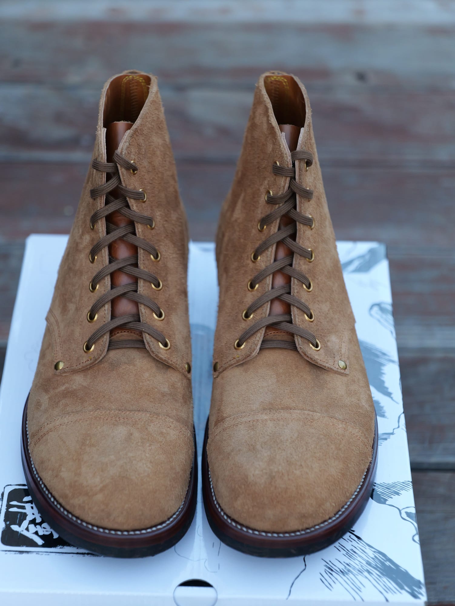 Front view of the Infantry boot pair and brass eyelets.