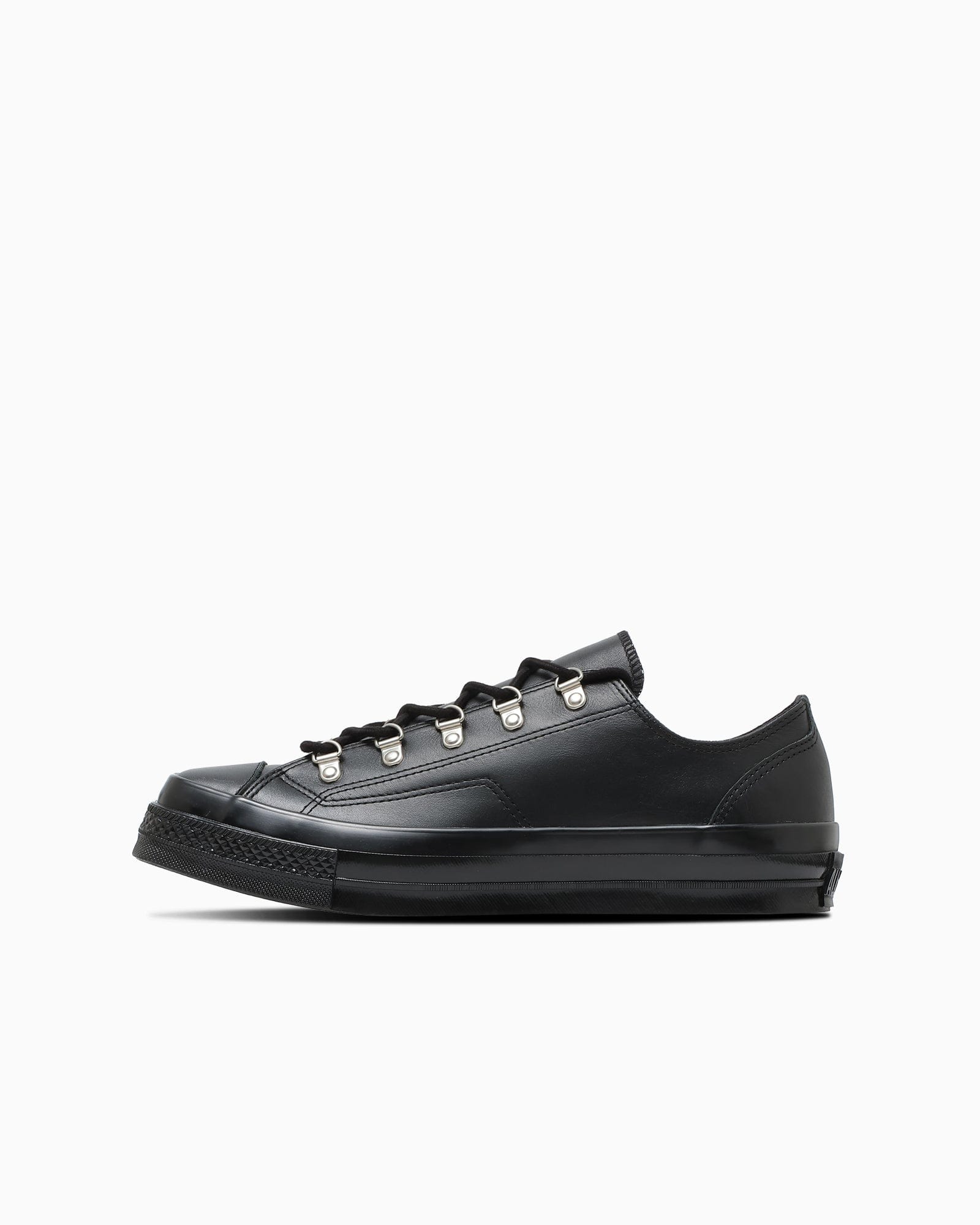 Side view of the black Squaretoe DR LE OX.