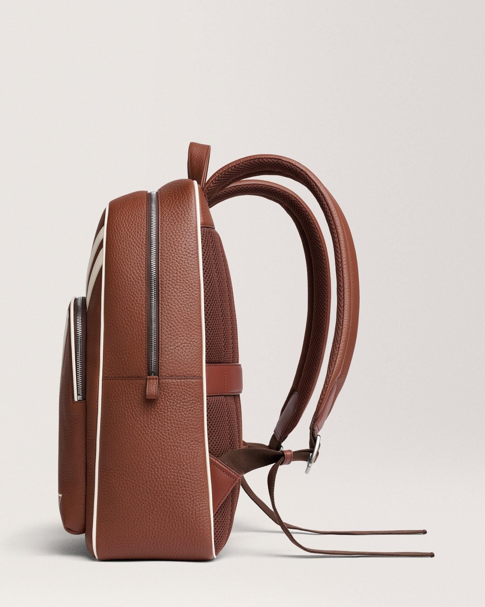 Side silhouette of the Grove backpack with shoulder straps.