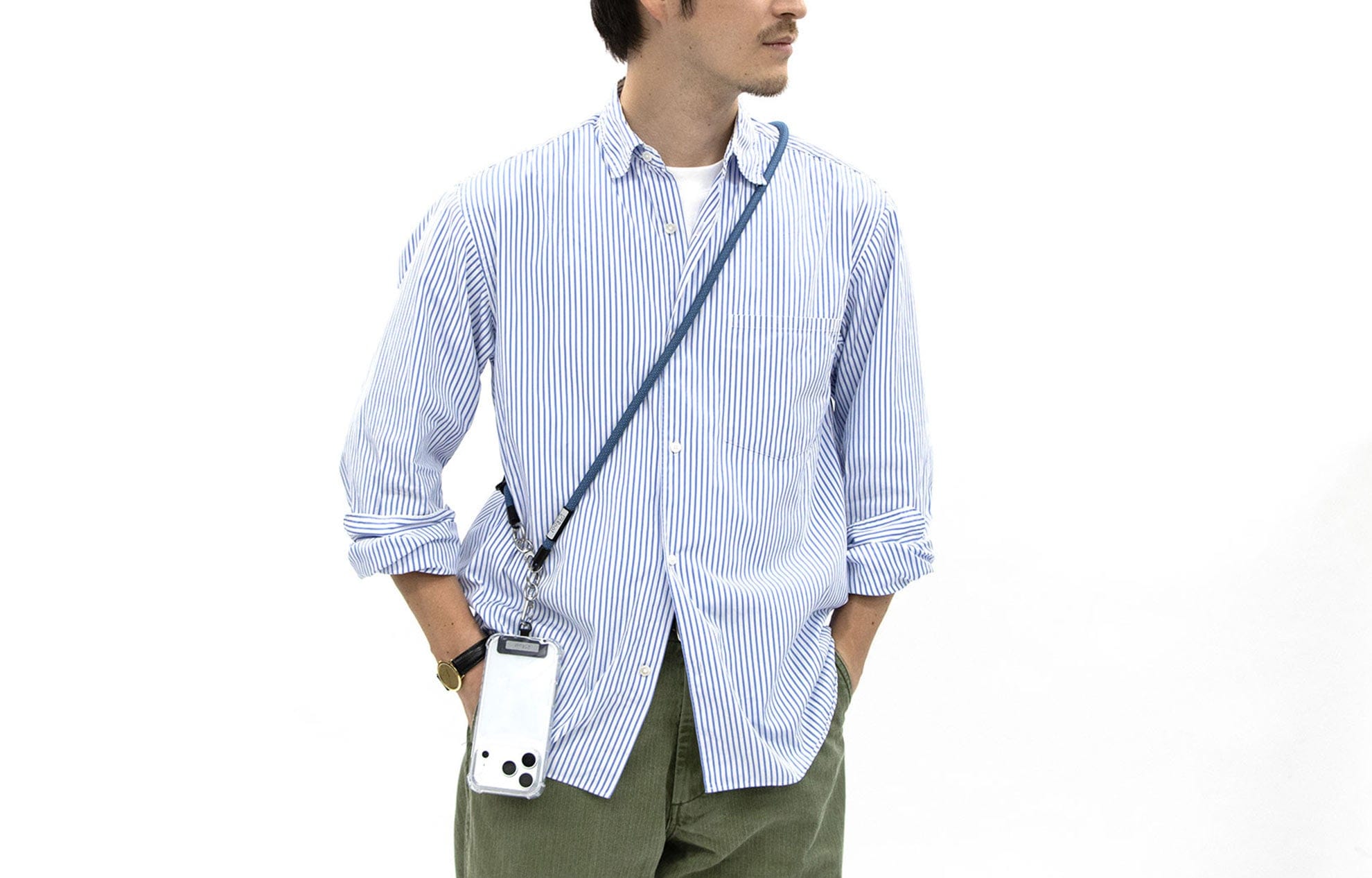Model wearing blue NODI cross-body phone strap
