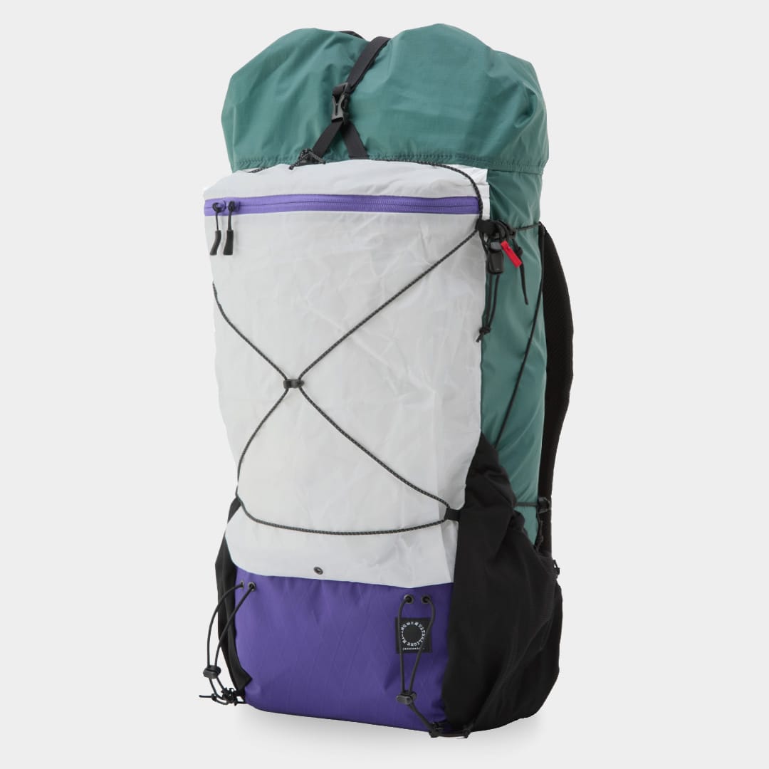 Past MINI Custom Edition example with blue-green body and white pocket; exact options may no longer be available