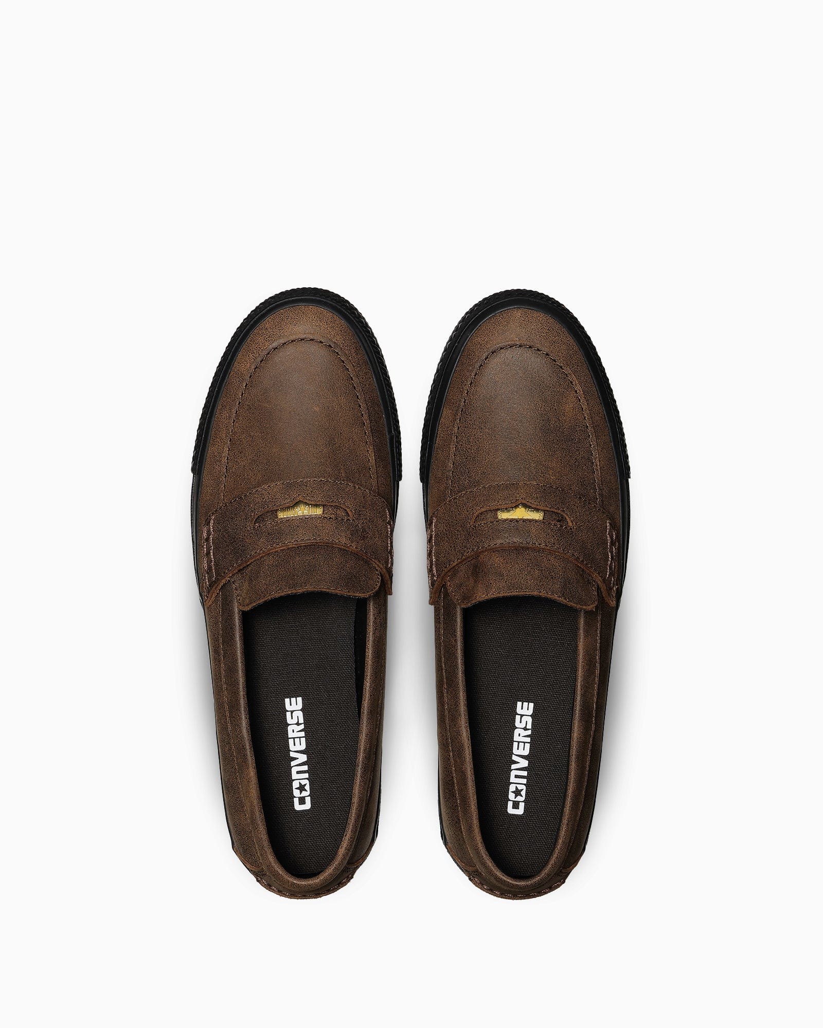 Top view of both dark-brown loafers and their insoles.