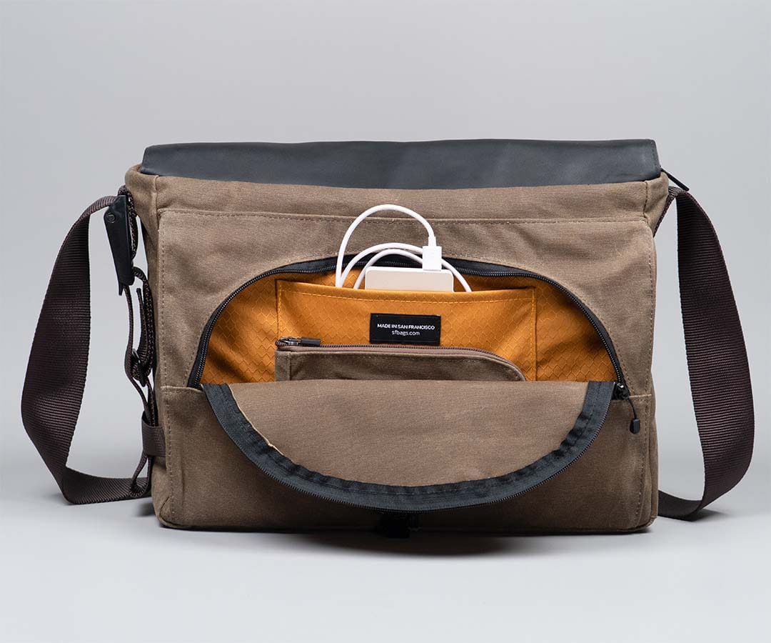 Cargo opened to reveal its bright lining and device storage.