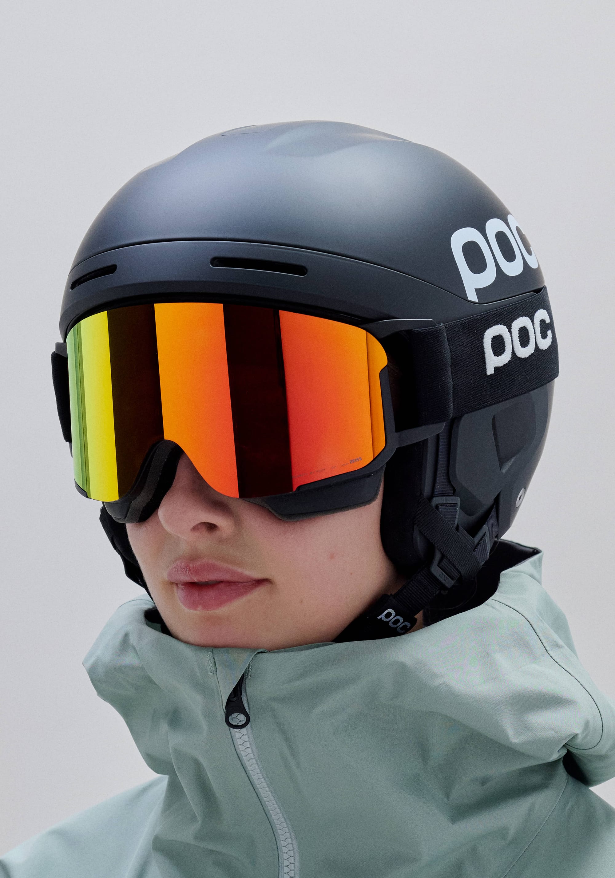Model wearing black Arcus helmet with goggles