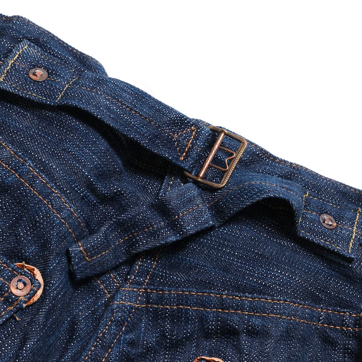Close view of the metal cinch buckle at the back waist.