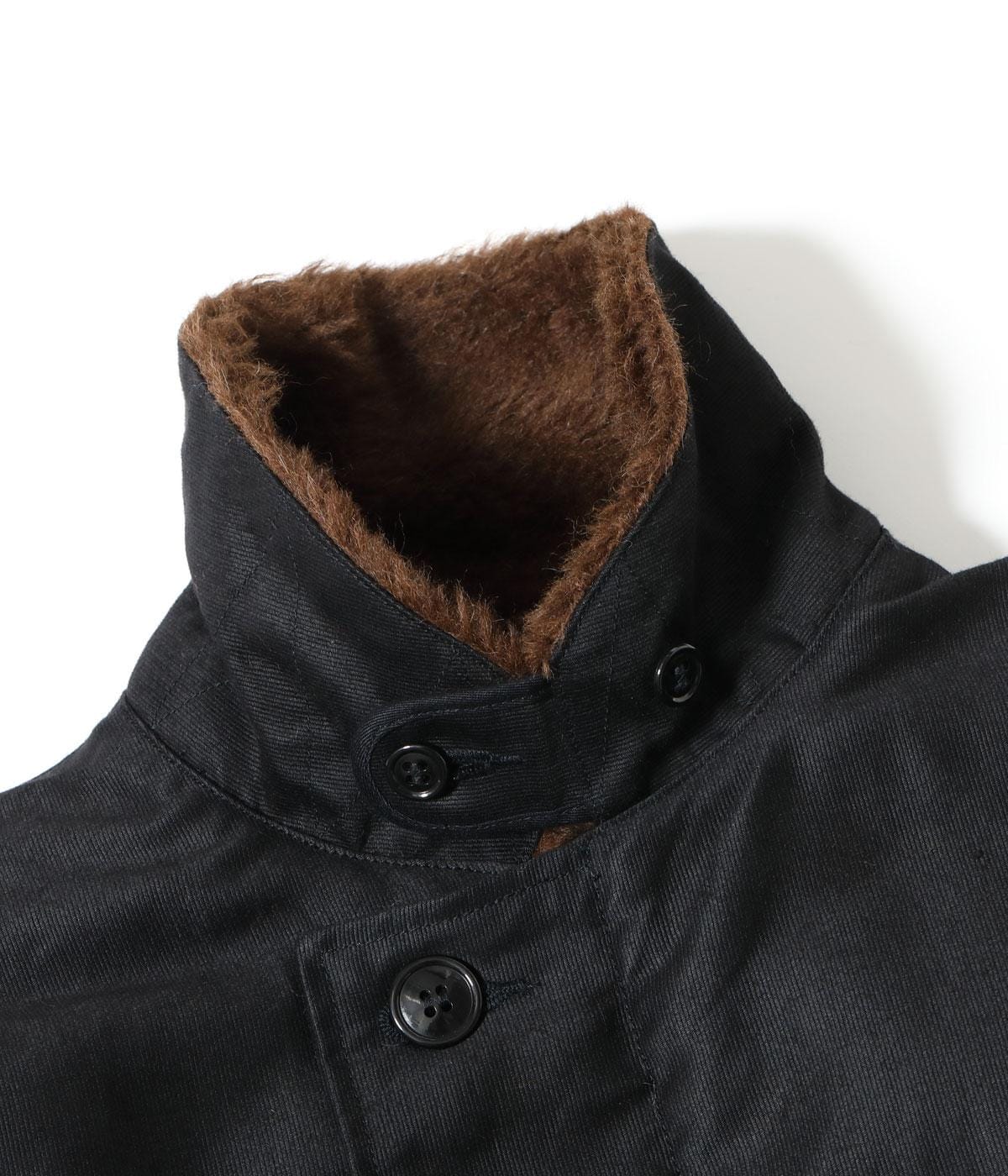 Closer view of the brown pile inside the jacket collar.