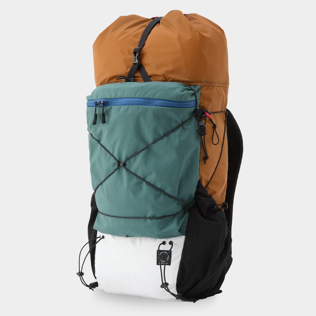 Past MINI Custom Edition example with cinnamon body and blue-green pocket; exact options may no longer be available