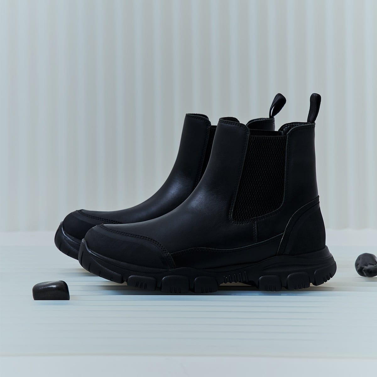 Black TREK CHELSEA boots from the side