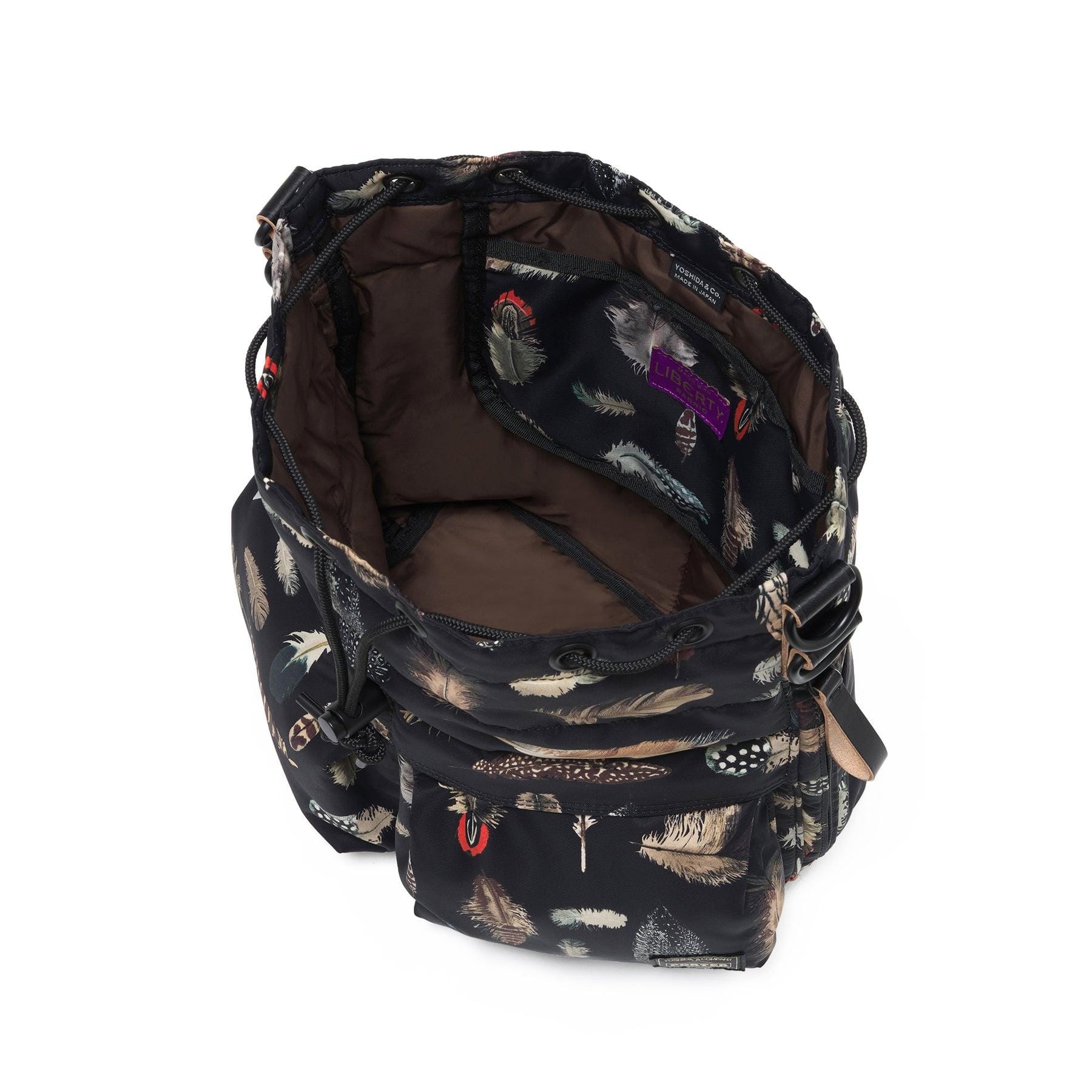 Open black Tool Bag showing lining and main compartment.