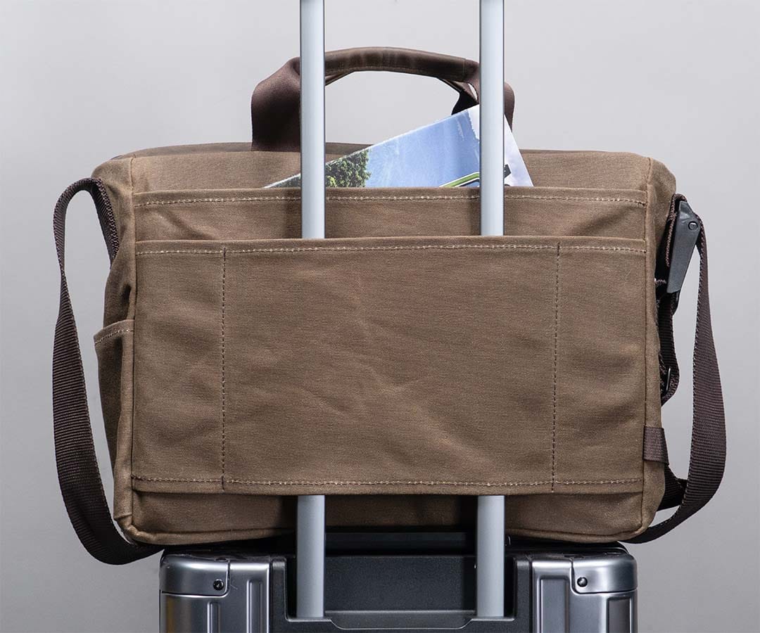 Rear of the Cargo sitting over a rolling suitcase handle.