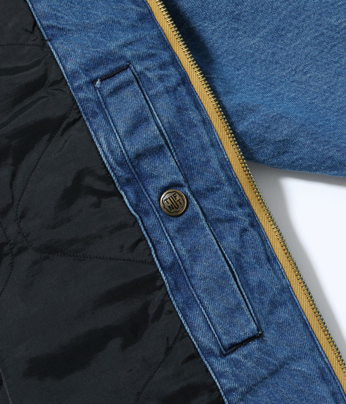 Opened jacket showing quilted lining