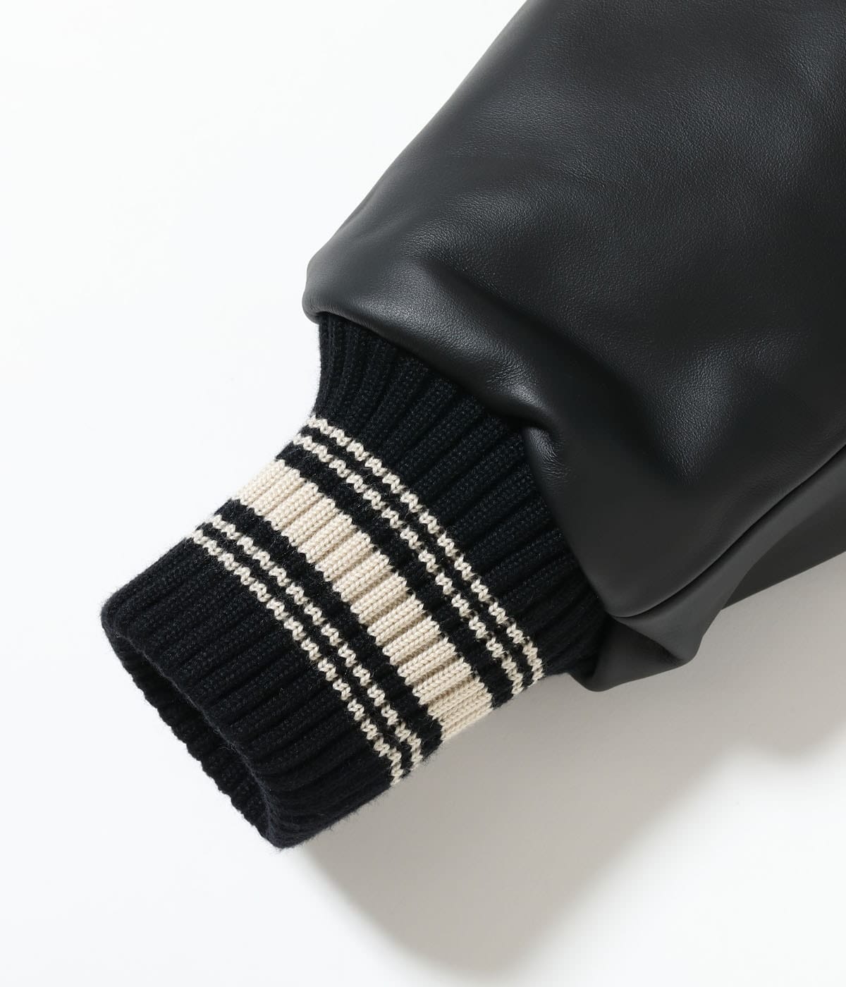 Steerhide sleeve and striped cuff