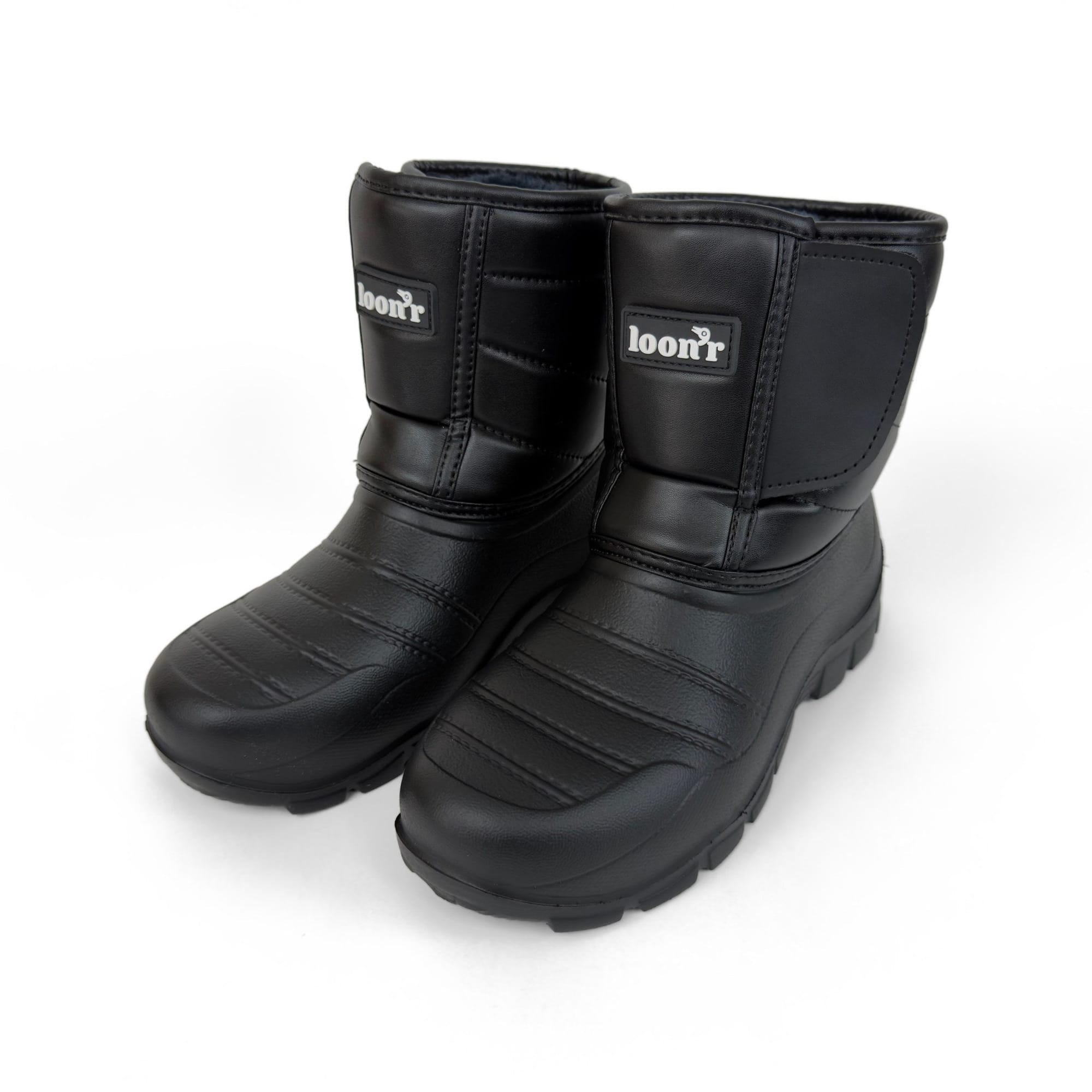 Pair of black Sidekick boots photographed from above.