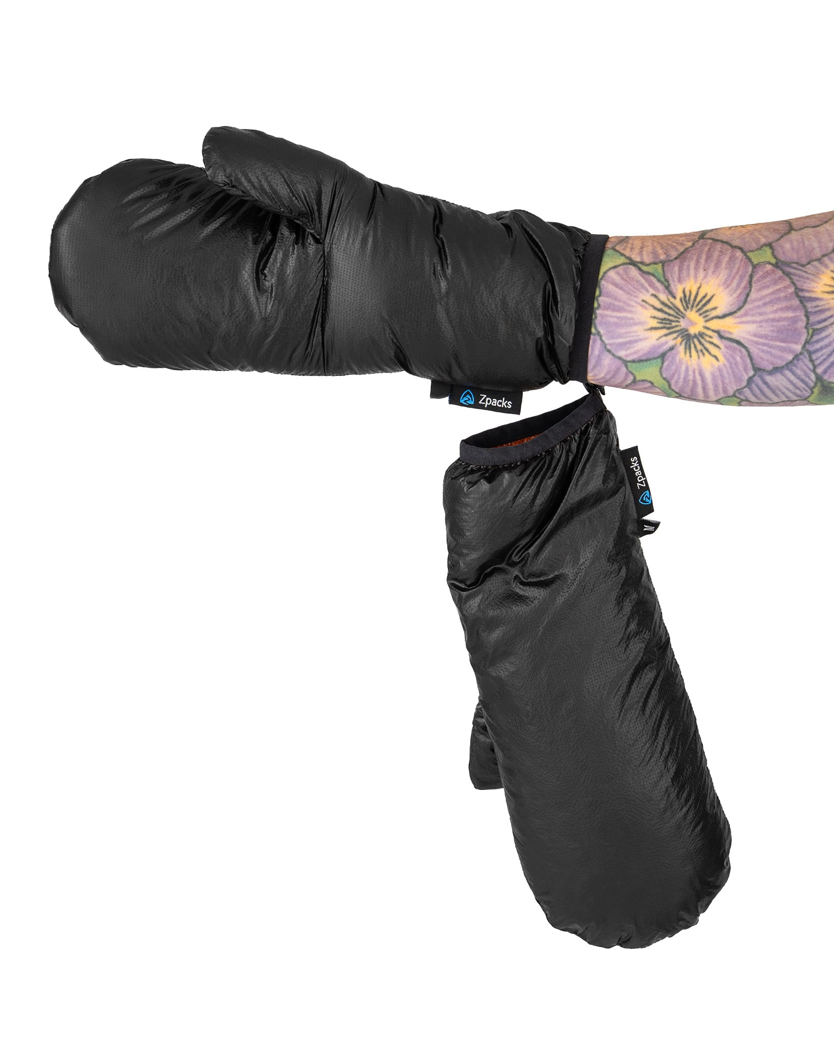 Black Down Mittens connected together while one is worn.