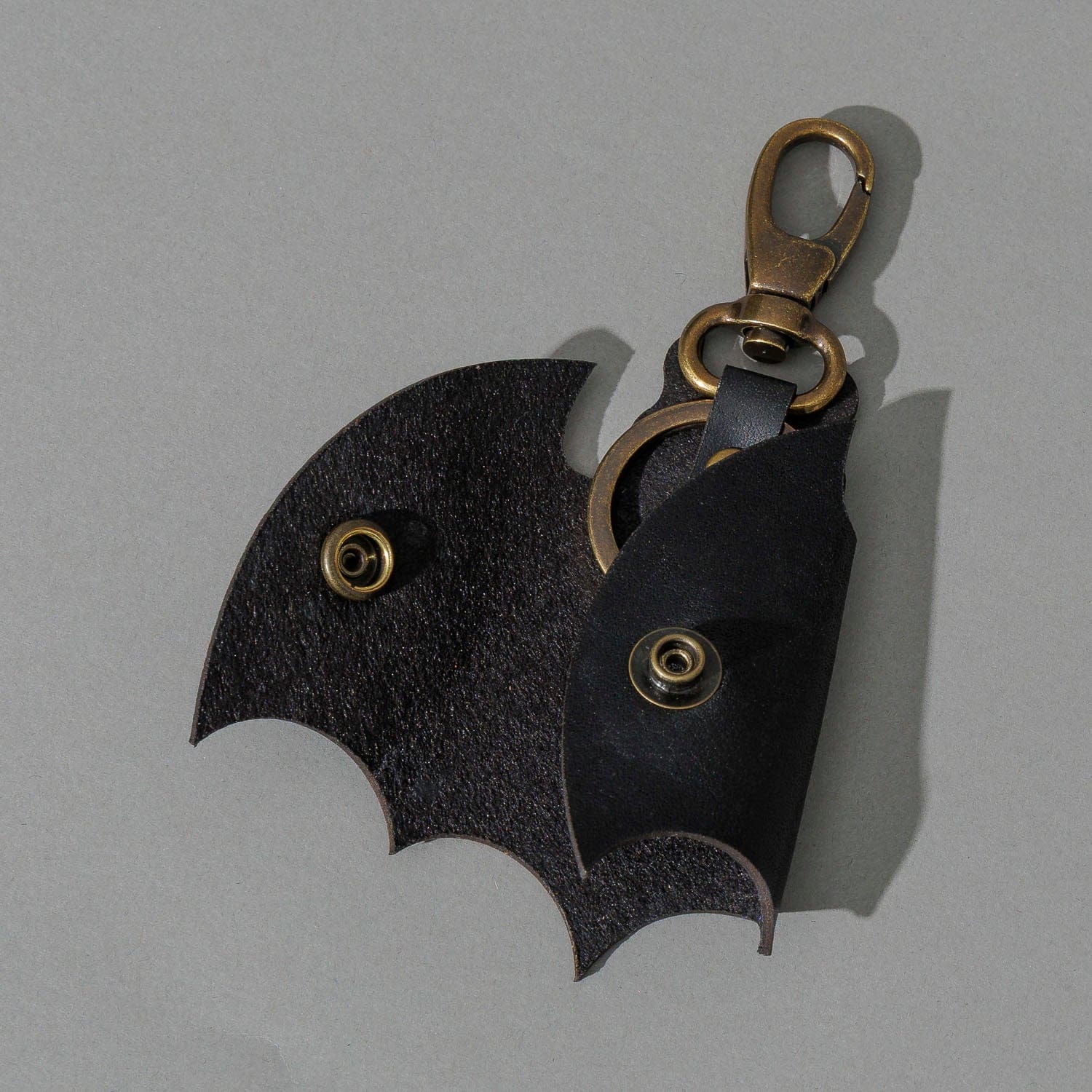 Black Bat Leather Key Case with its snap open