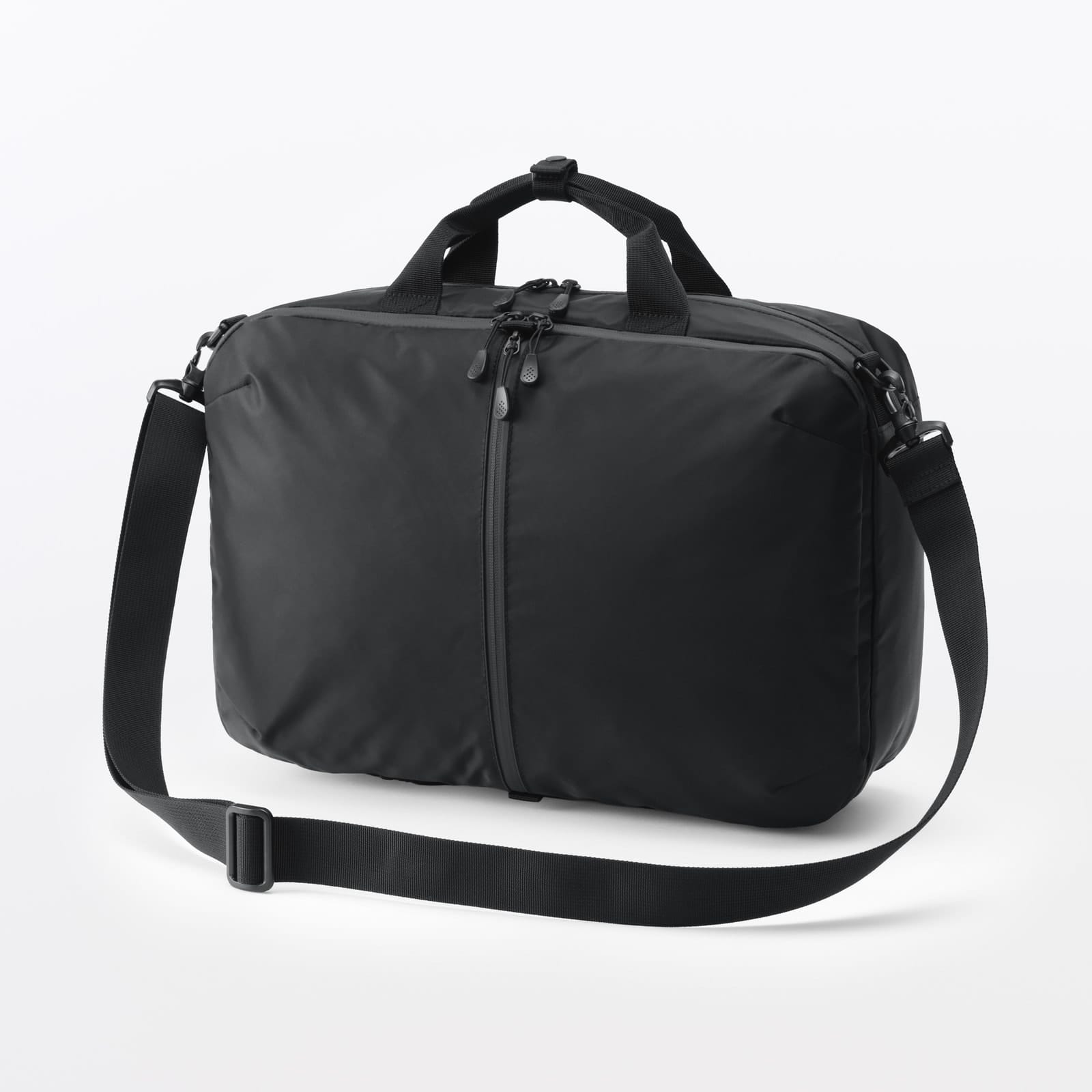 Black MUJI three-way business bag with its detachable shoulder strap