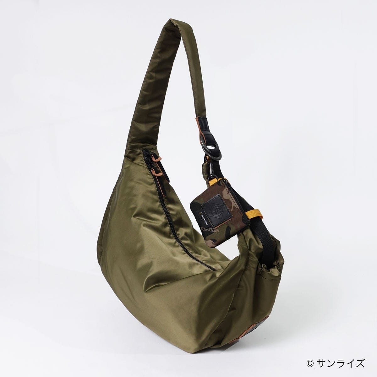 Olive Ark Shoulder Bag M with a broad shoulder strap and camouflage pouch.