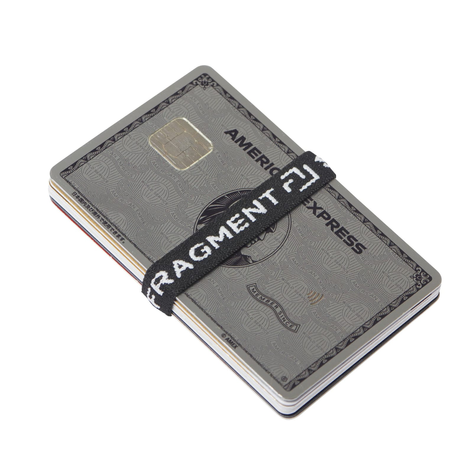 Official demonstration of a longer RAMIDUS band securing a card stack lengthways.