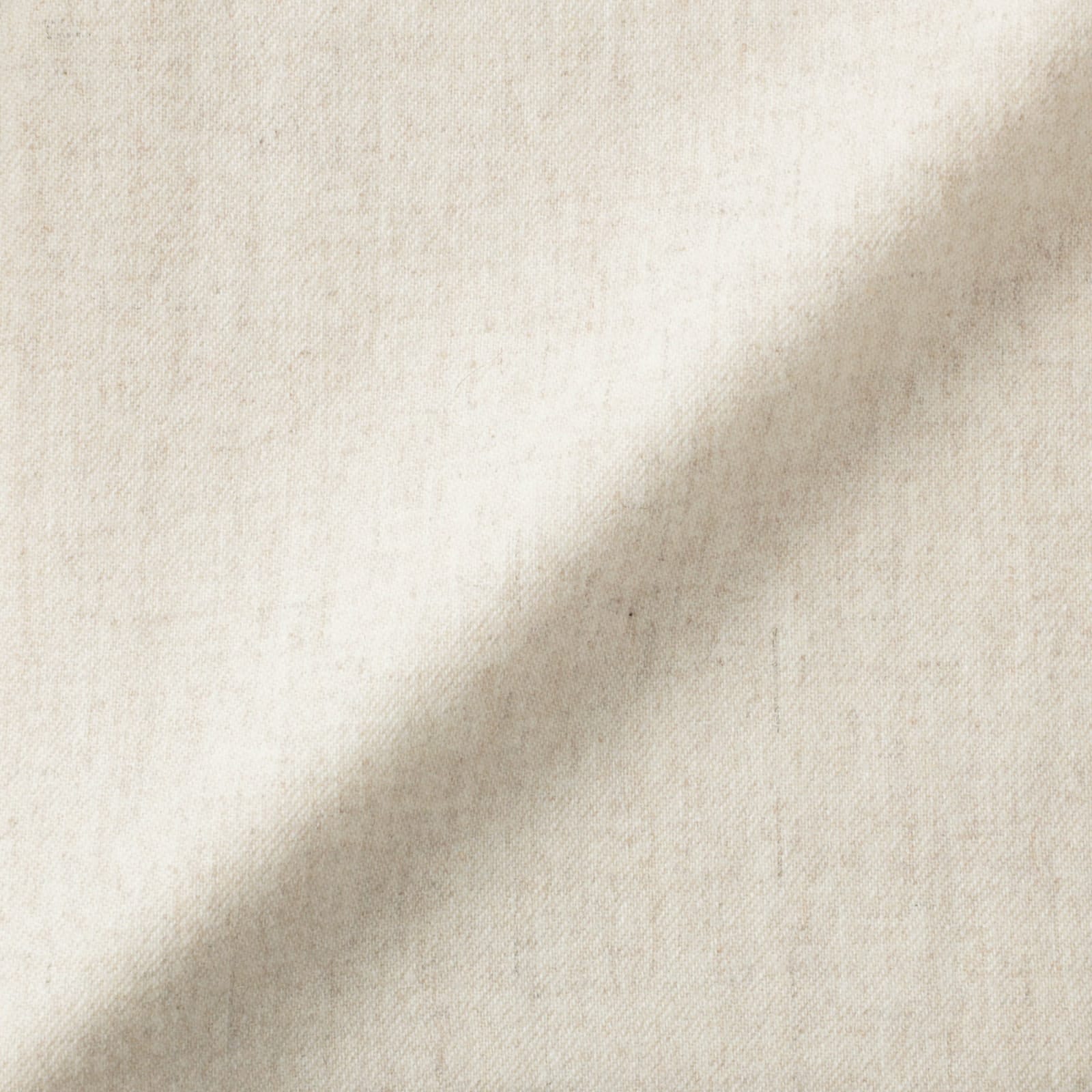 Close-up of the ivory wool and reclaimed-cashmere blend fabric