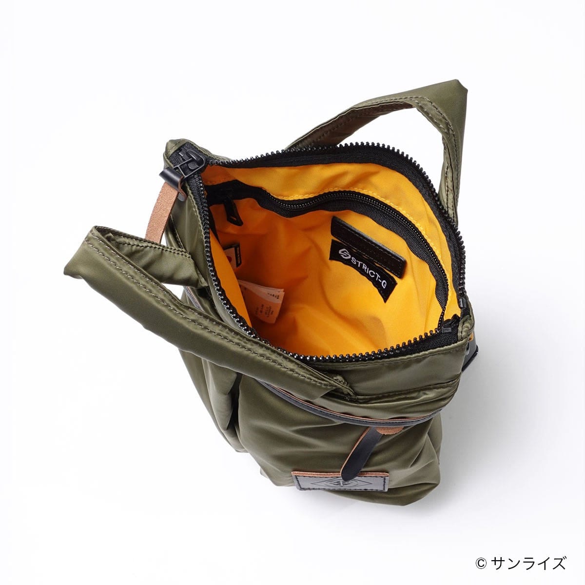 Top view into the open Lightning Helmet Bag S and its yellow lining.