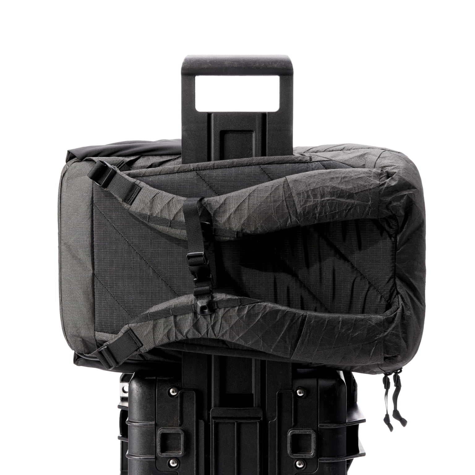 The CTB26 ULTRA secured horizontally over a suitcase handle.