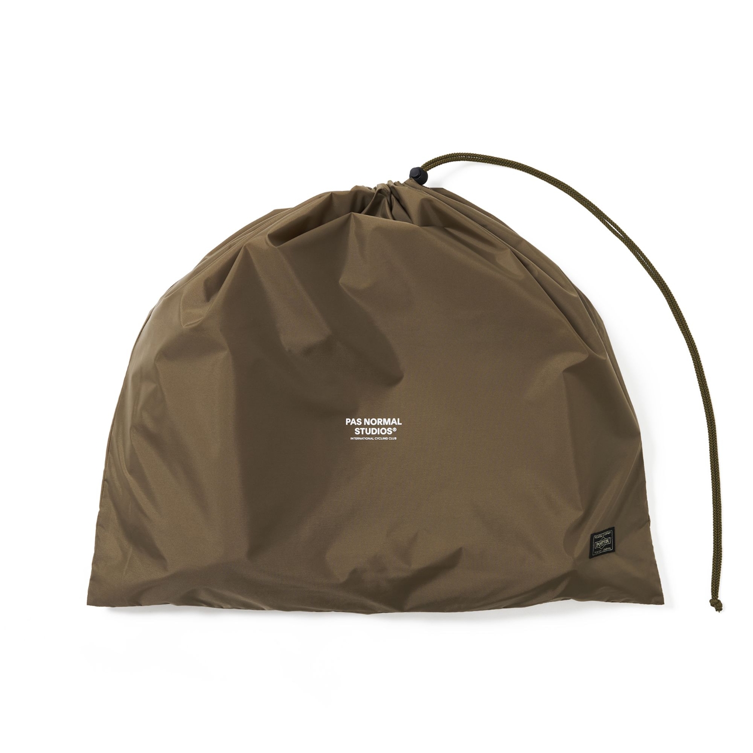 Brown drawstring pouch carrying the Pas Normal Studios logo and a PORTER label.