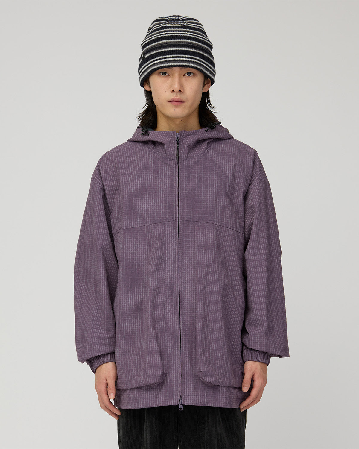 Front view of the Dark Purple Kasuri Ripstop Jacket in Snow Peak's styling photography.