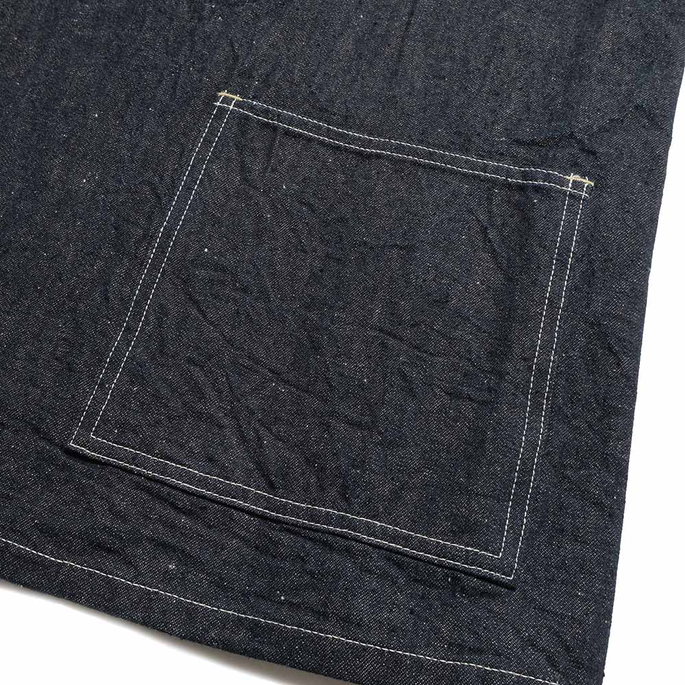 Close view of a rectangular patch pocket and contrast stitching on the SC15920 coat.