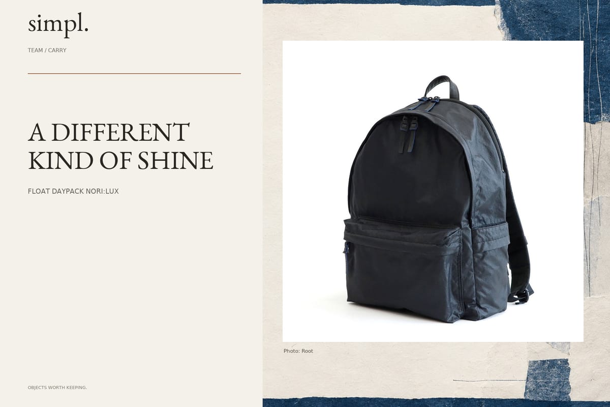 Root gives the Float Daypack a polished nylon finish — credited official product photograph in the simpl. cover.