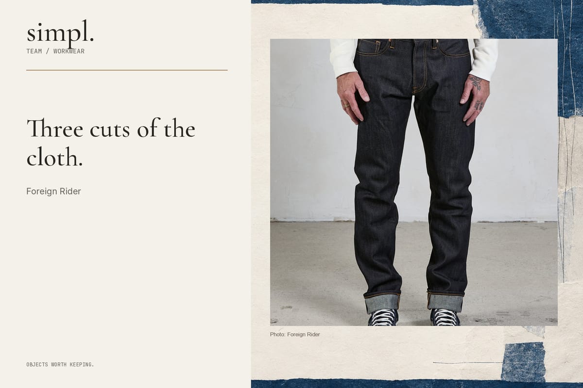 Waist-to-cuff view of Foreign Rider indigo selvedge jeans inside the simpl. branded feature cover.
