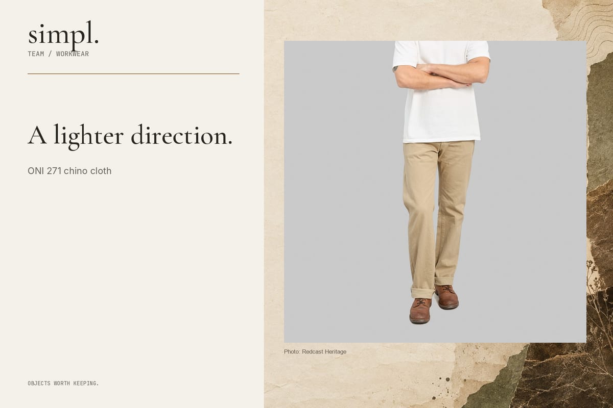 ONI khaki-beige chino jeans worn from the front, shown in a deliberate below-face crop inside the simpl. branded feature cover.