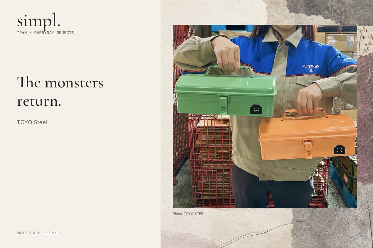 Person holding TOYO STEEL Y-280 Halloween toolboxes in Pumpkin Orange and Franken Green.
