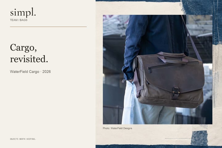 WaterField’s waxed-canvas Cargo worn at the hip with its leather flap closed.